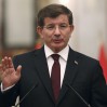 Turkey's Prime Minister Ahmet Davutoglu speaks at a news conference with Iraqi Prime Minister Haider al-Abadi (not pictured) in Baghdad, November 20, 2014. REUTERS/Hadi Mizban/Pool (IRAQ - Tags: POLITICS)