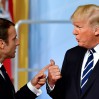 (L-R) French President Emmanuel Macron and US President Donald Trump talk after a family photo of the participants of the G20 summit in Hamburg, northern Germany on July 7, 2017.
Leaders of the world's top economies gather from July 7 to 8, 2017 in Germany for likely the stormiest G20 summit in years, with disagreements ranging from wars to climate change and global trade. / AFP PHOTO / Tobias SCHWARZ (Photo credit should read TOBIAS SCHWARZ/AFP/Getty Images)