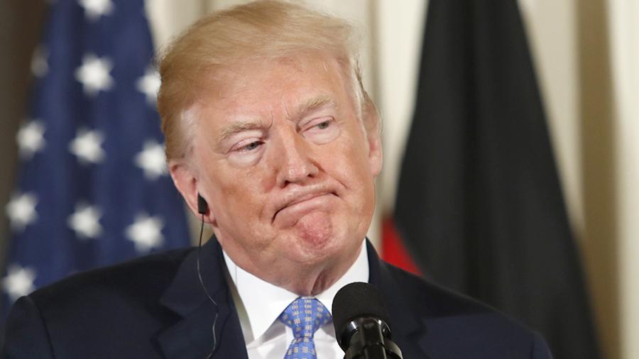 Трамп не уверен в парижской встрече с Путиным