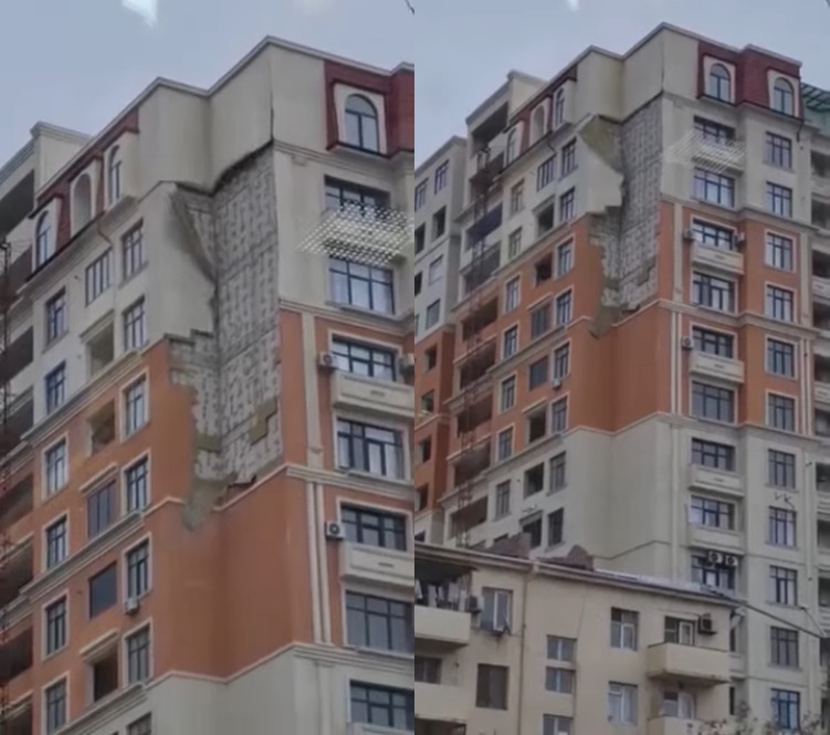 В Баку ветер сорвал облицовку новостройки